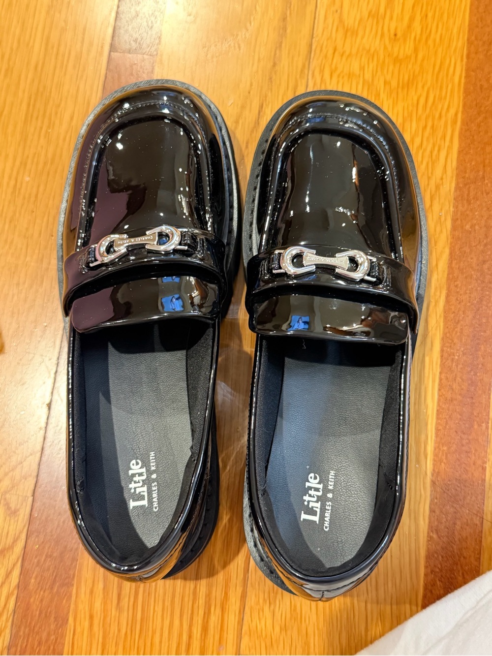 Charles & Keith Black Patent Kids Loafers with Silver Buckle